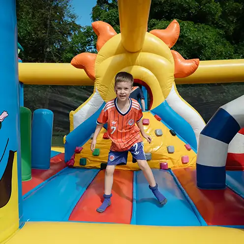 A boy playing on a bouncy castle at Aberlour's National Day for Play event in Aberdeen