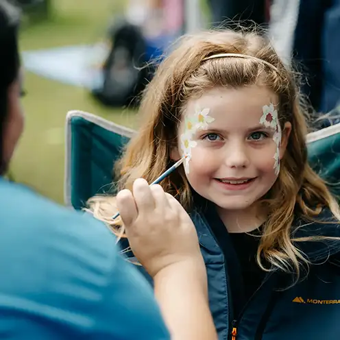 A girl having her face painted at Aberlour's National Day for Play event in Aberdeen