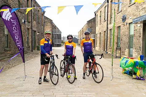 David, Jozanne and Neil cycling from Aberlour to Stirling
