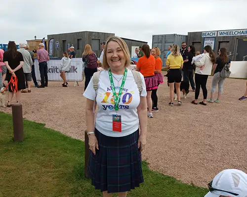 A group of Aberlour Kiltwalk fundraisers celebrating at the finish line